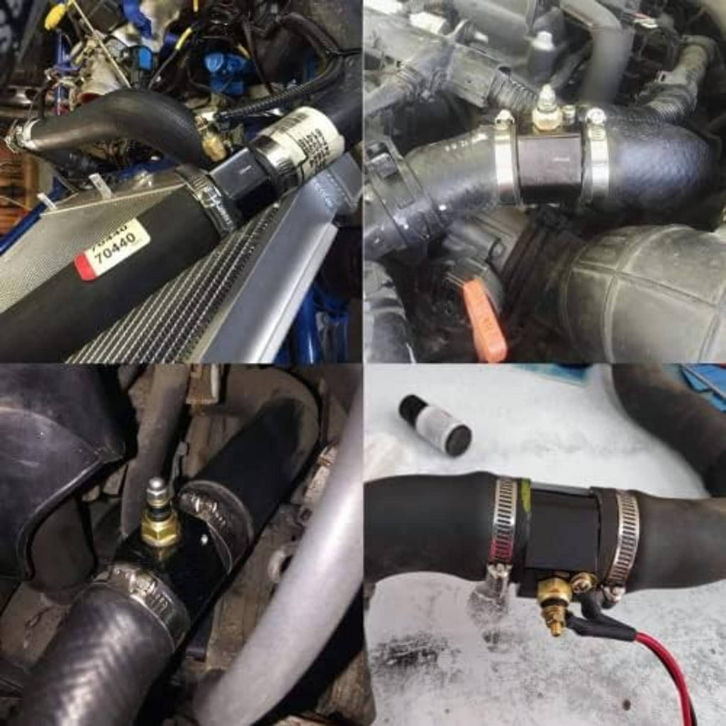 Black temperature gauge joint pipe fitted on engine coolant hoses with sensor connection