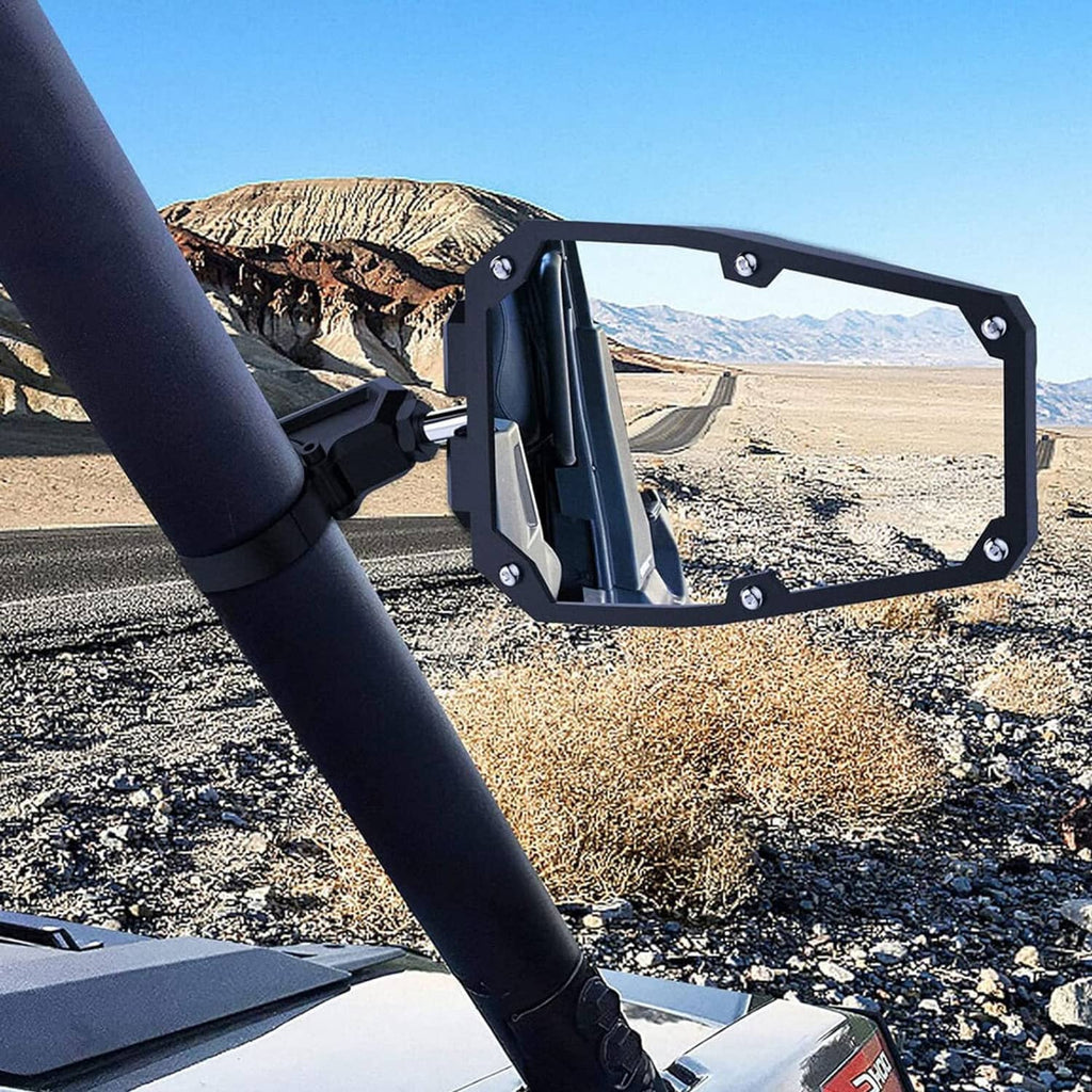 Mounted black UTV side mirror with hex bolts on a roll bar, road view lens