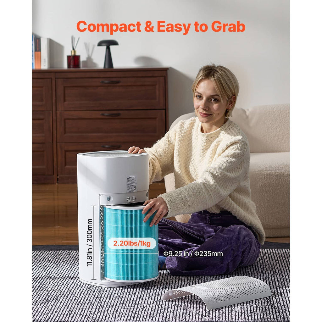 Blue air purifier filter replacement cylinder with black top, shown beside an air purifier