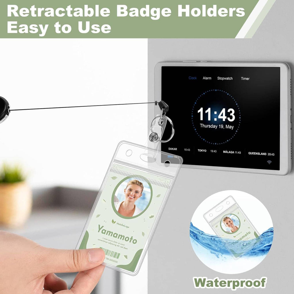 Clear ID badge holder with retractable reel clip attached to a keyring