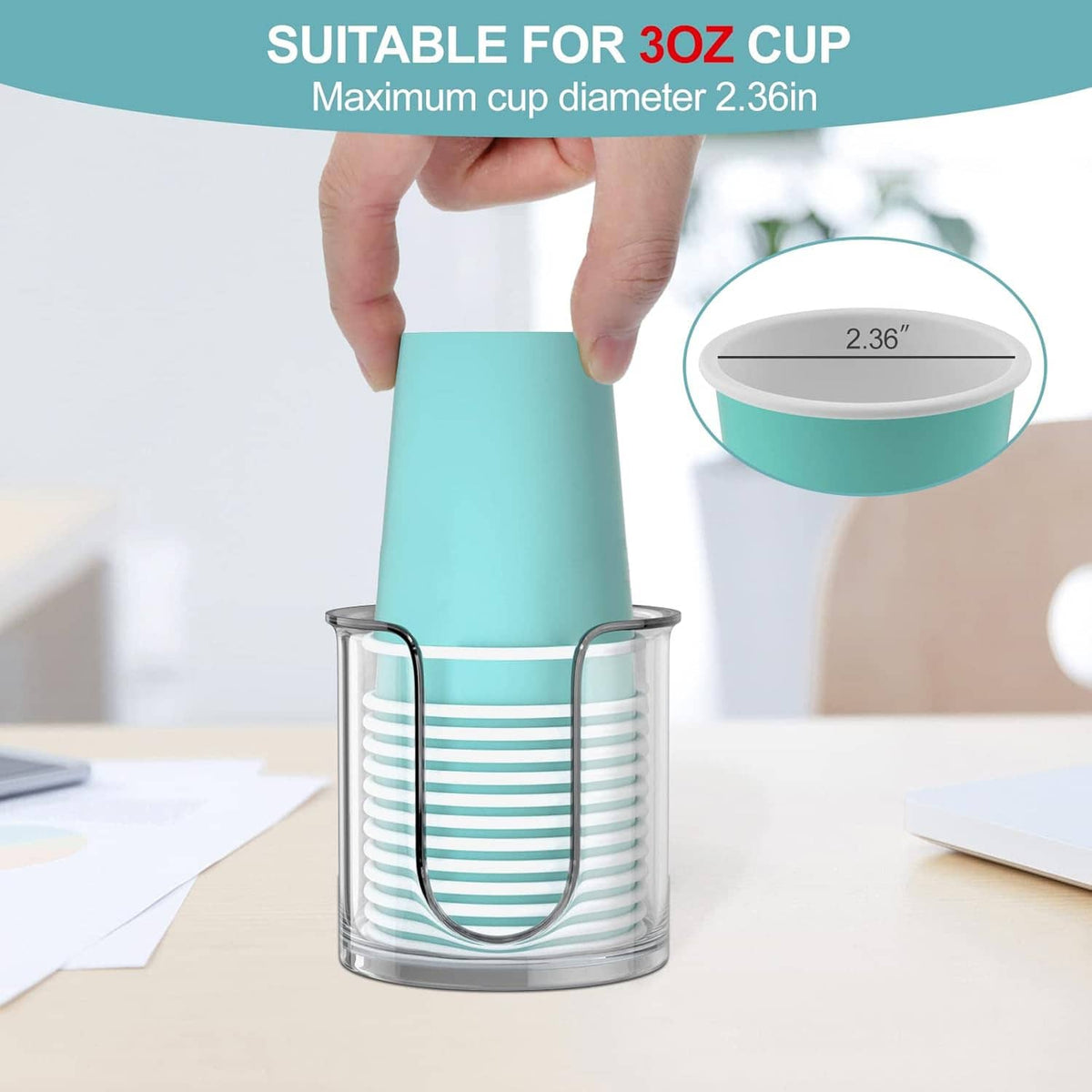 Bathroom cup dispenser with mint top; hand inserting a paper cup into the holder