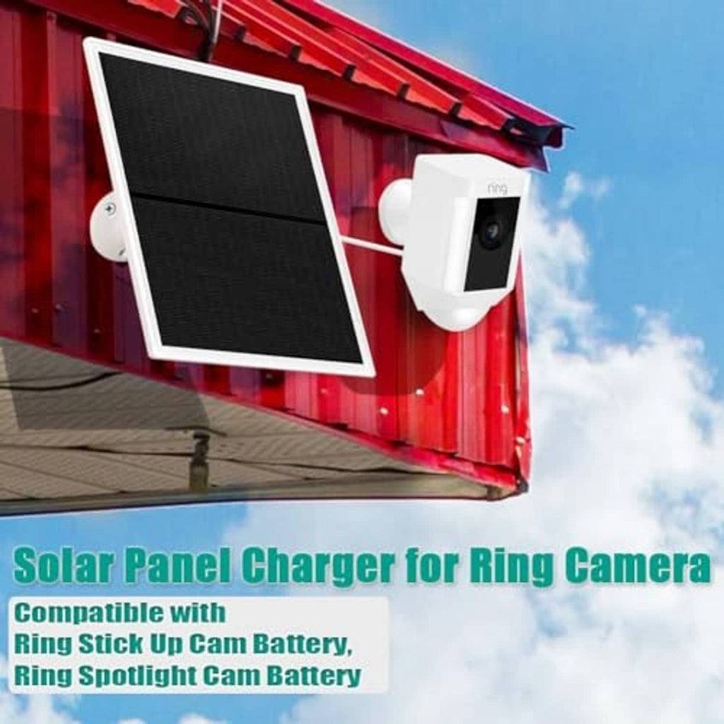 White solar panel charger with black solar panel and wall-mounted security camera