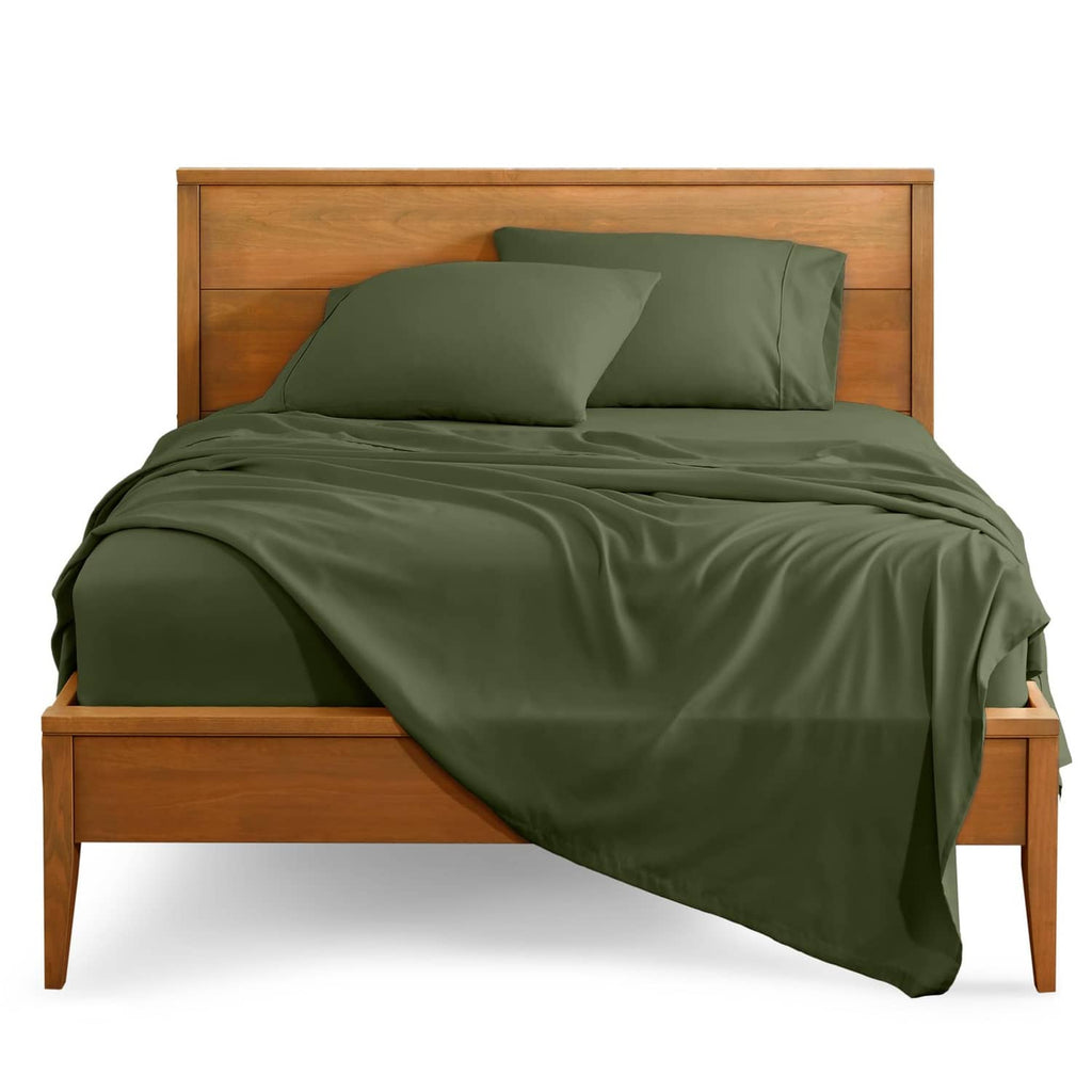 King bed sheet set in deep olive green with pillowcases and draped flat sheet