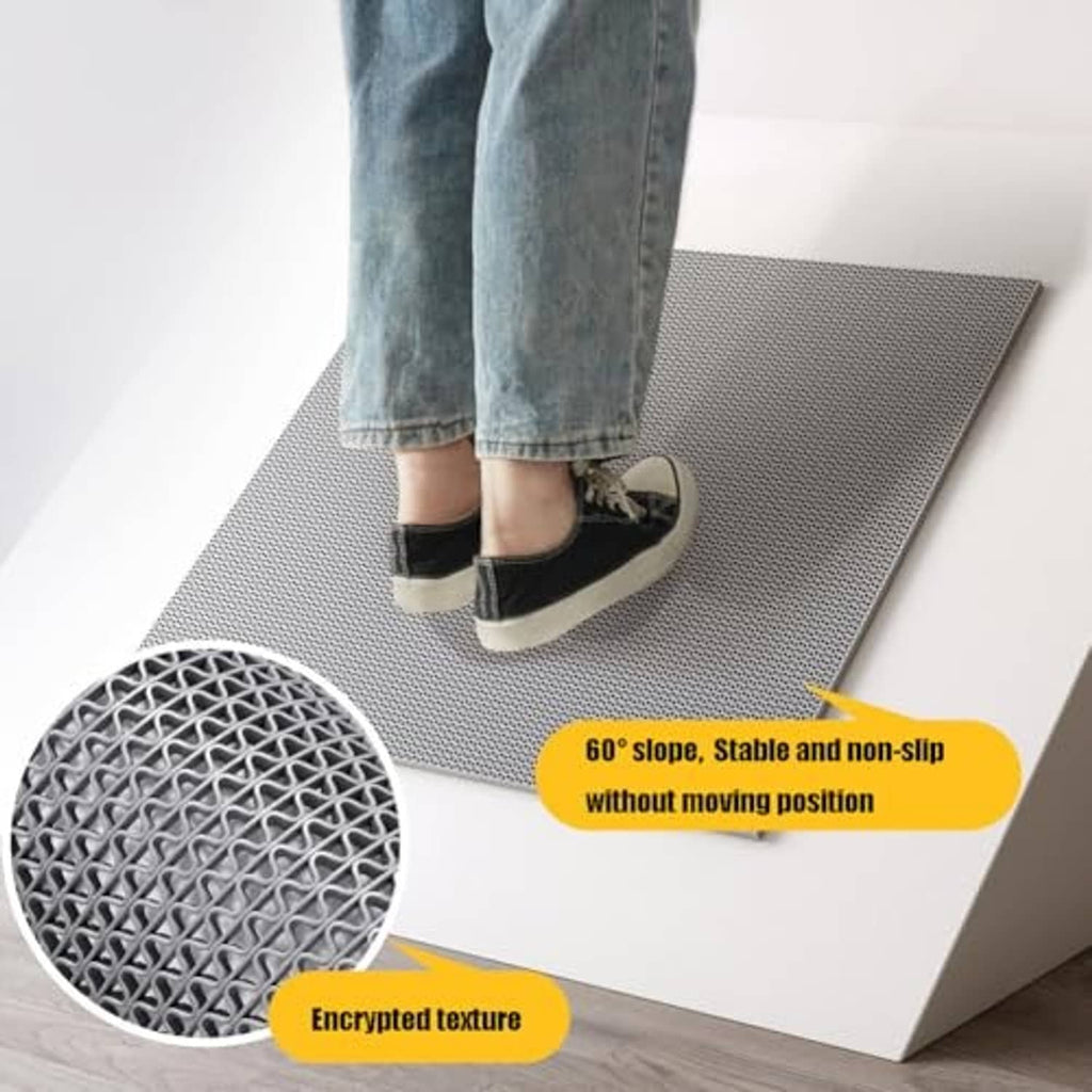 Gray non-slip pool mat with raised grid texture under walking foot