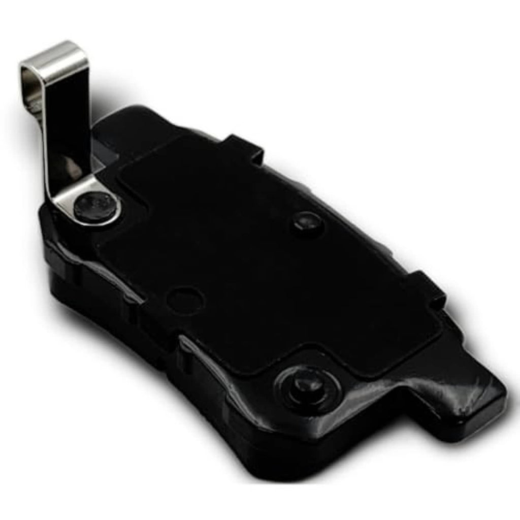 Black brake pad backing with mounting hardware and metal wear points