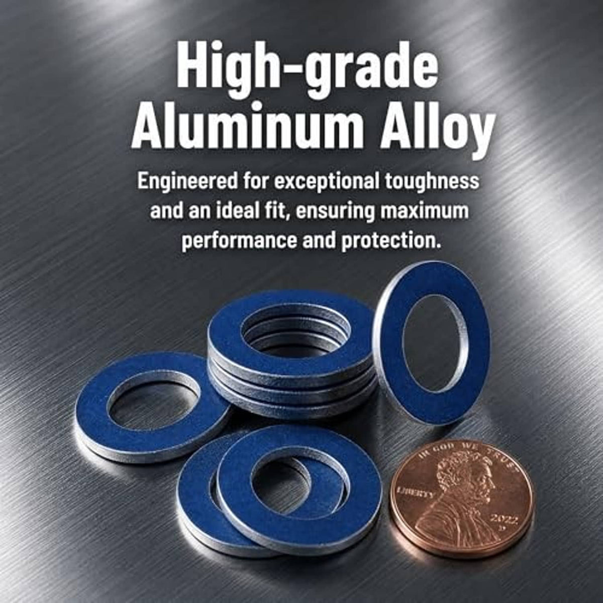 Blue oil drain plug gasket washers, circular discs on dark metal surface