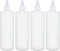 Four empty white condiment squeeze bottles lined up, each with twist cap nozzle