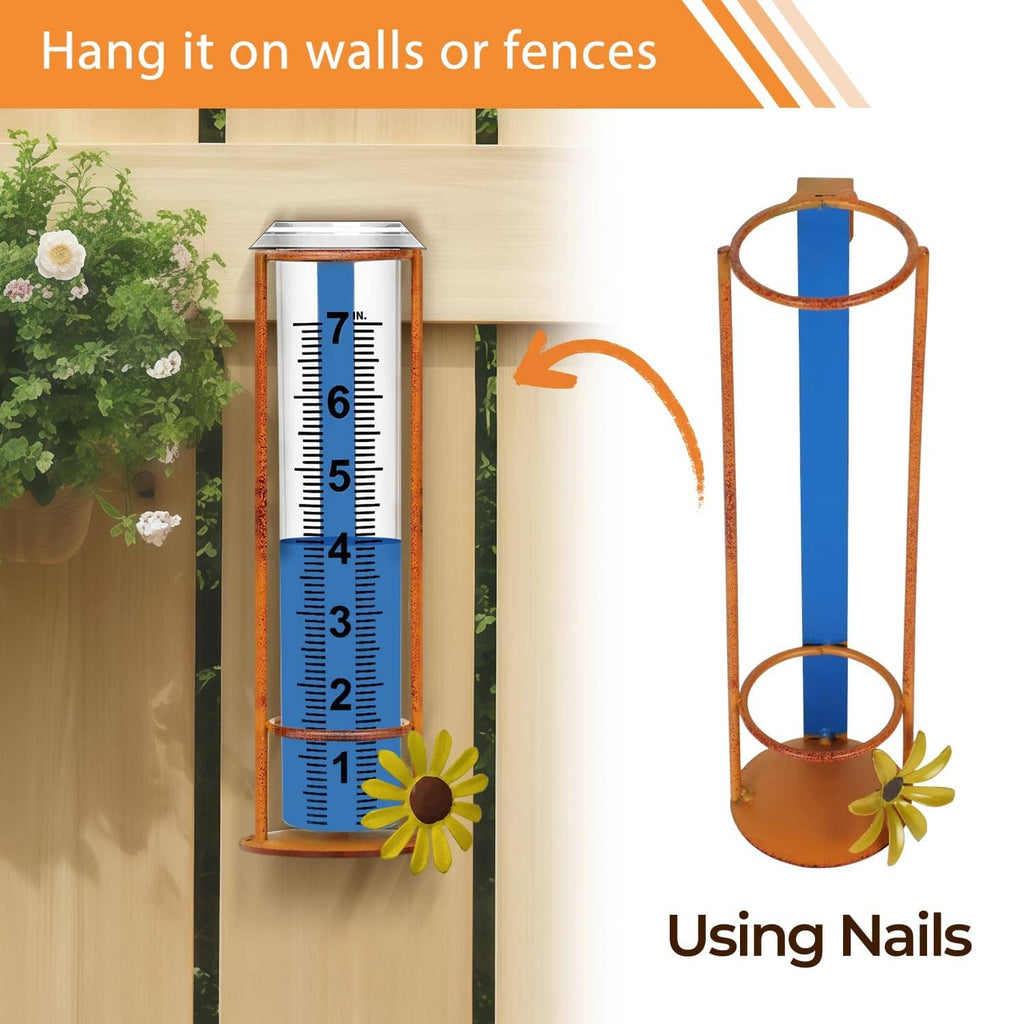 Hanging rain gauge with blue measurement tube, brown frame rings, and flower accents
