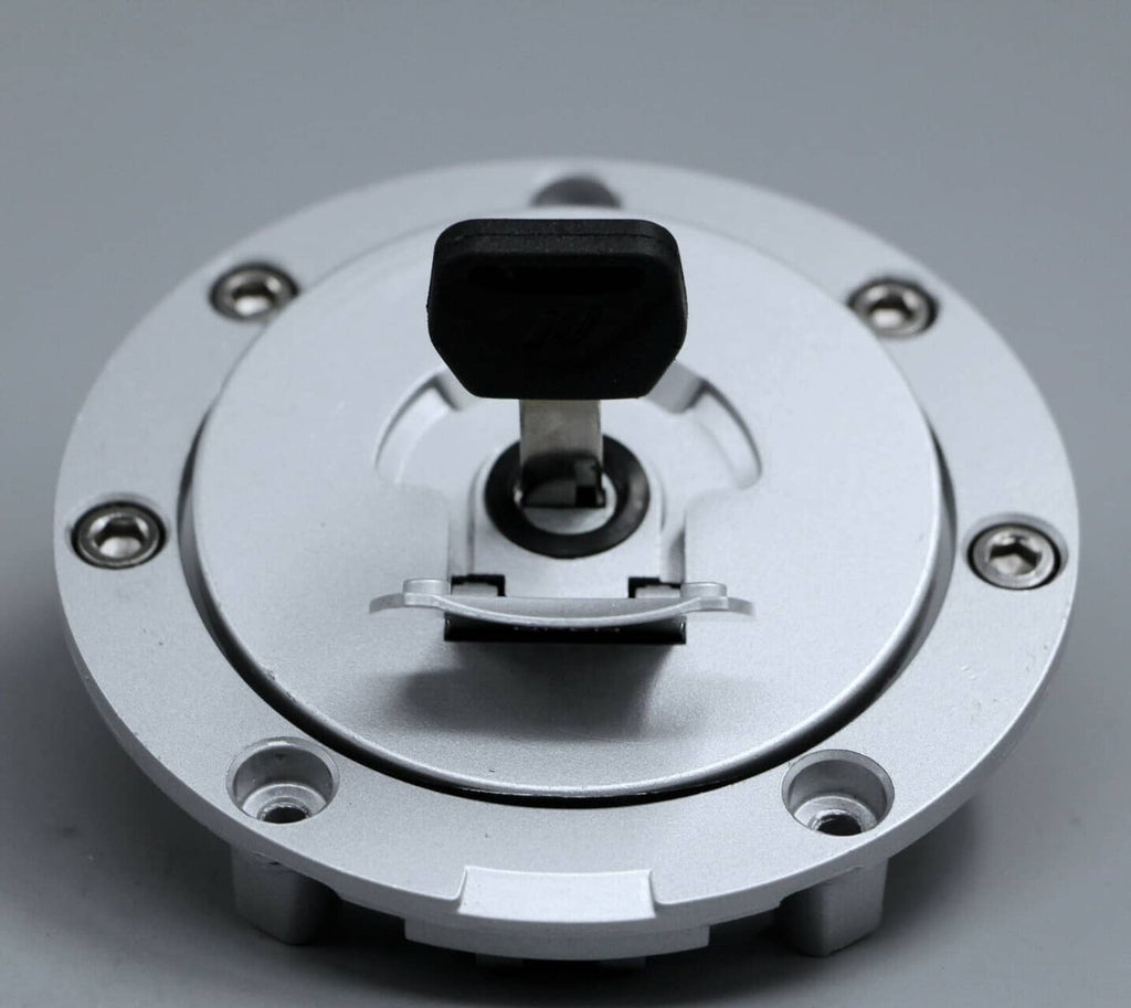 Fuel gas cap lock assembly with black cap cover and mounting bolts