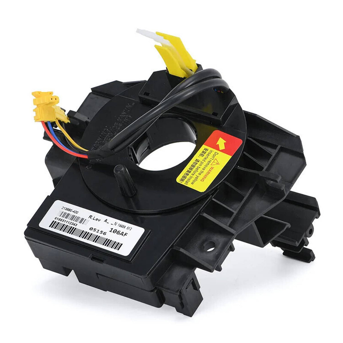 Black clock spring with steering angle sensor, yellow connectors, and warning label
