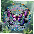 Hanging butterfly wind spinner with purple and blue wings, decorative bead border