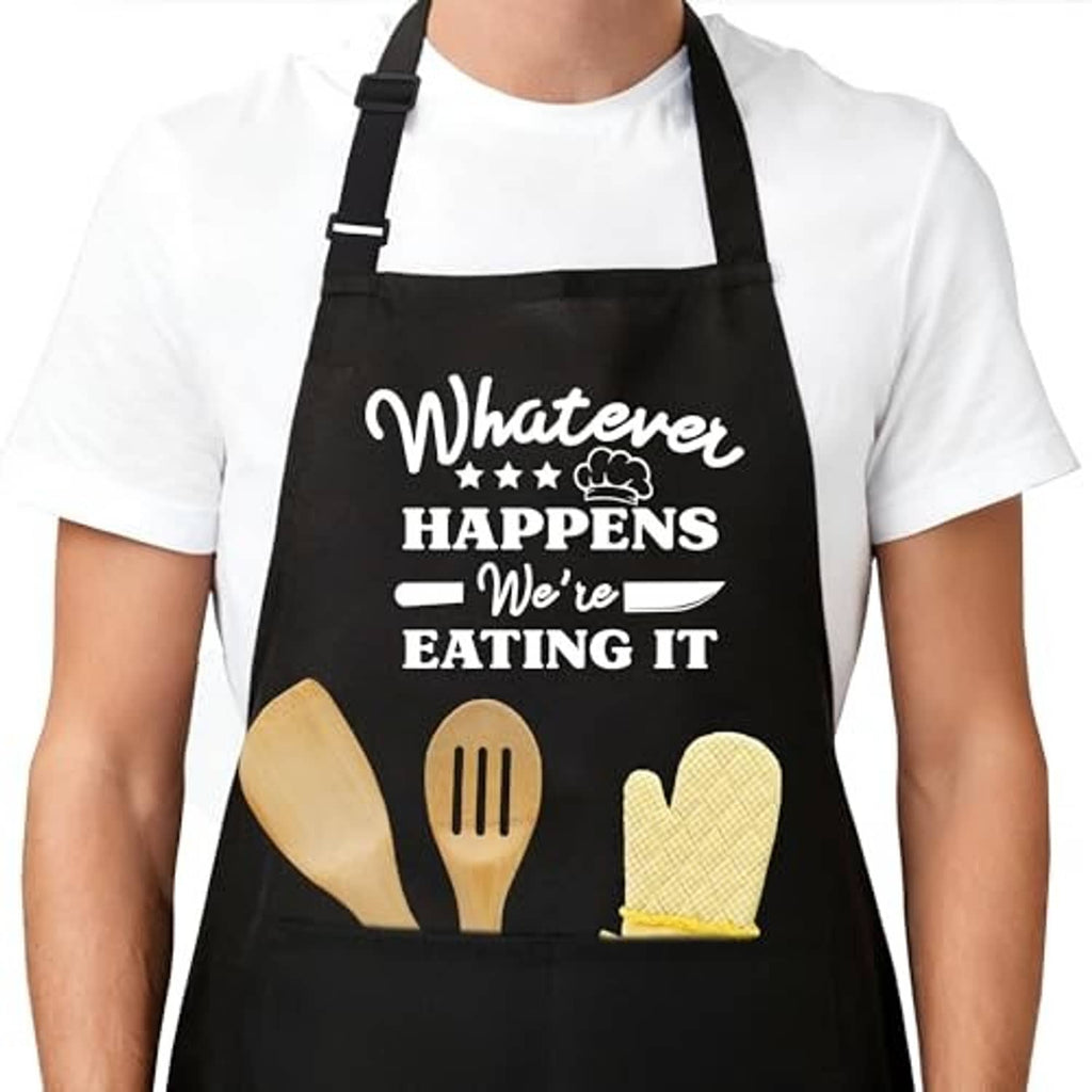 Black cooking apron with printed text “Whatever happens we’re eating it” on chest area