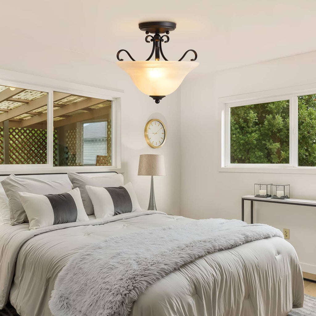 Black semi-flush ceiling light with frosted glass shade and soft warm glow