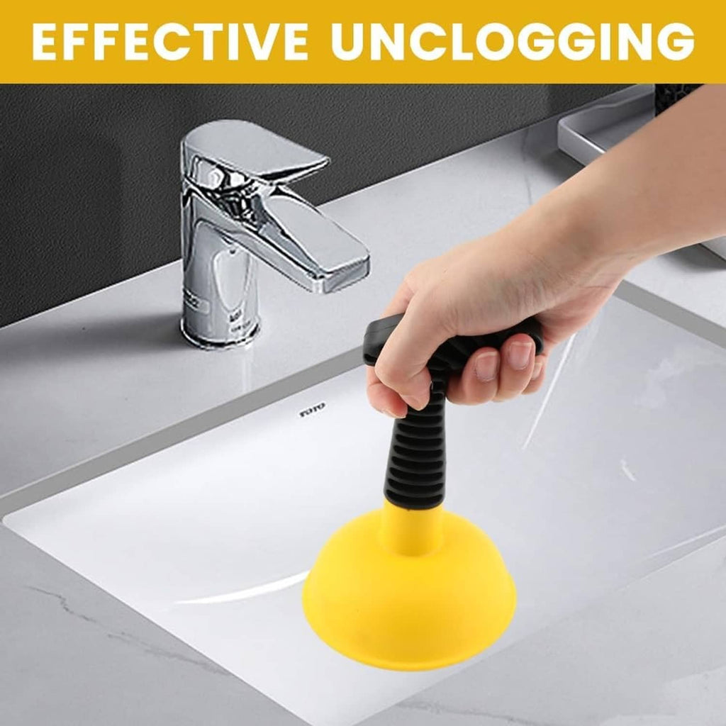 Mini sink plunger on sink drain; yellow cup and short black ridged handle