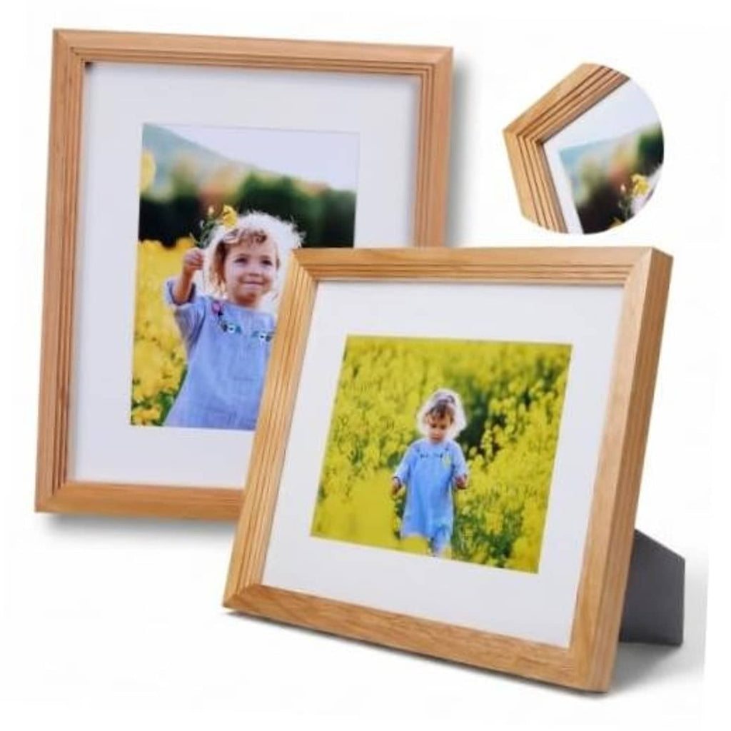 Light wood picture frame set, one front and one angled, displaying a child photo