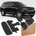 Black all-weather TPE floor mat set with molded channels and raised traction nibs