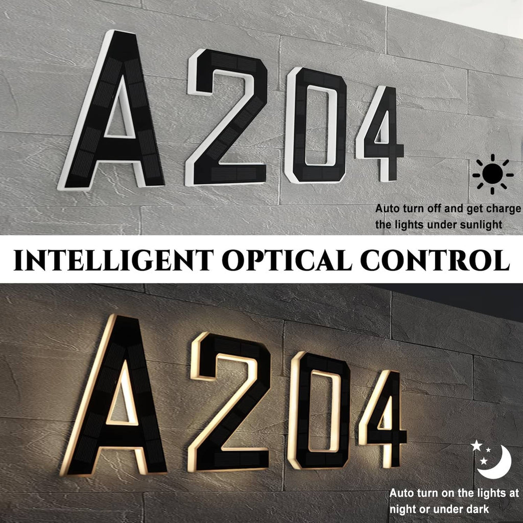 Solar house number lights showing A204, glowing white digits on black frames