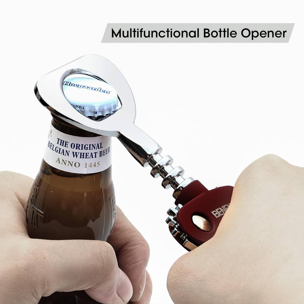 Handheld purple wine corkscrew with chrome spiral and wing levers lifting a cork