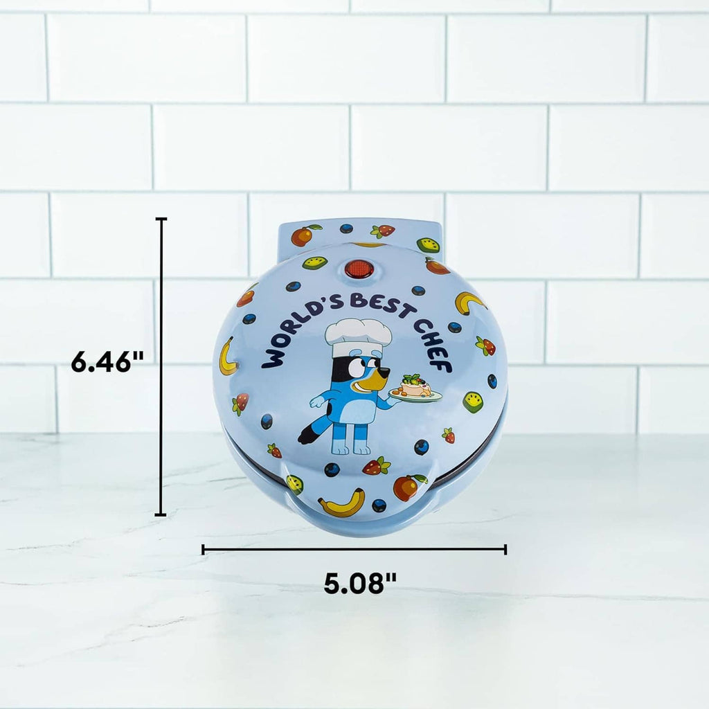Light blue mini waffle maker with chef graphic; size labels 6.46 in and 5.08 in