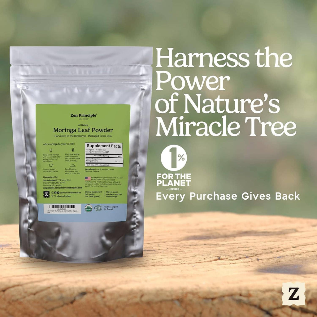 Single moringa leaf powder silver pouch with green label, standing on wooden surface