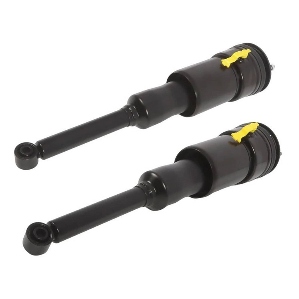 Two black rear air struts with extended rods and yellow support brackets