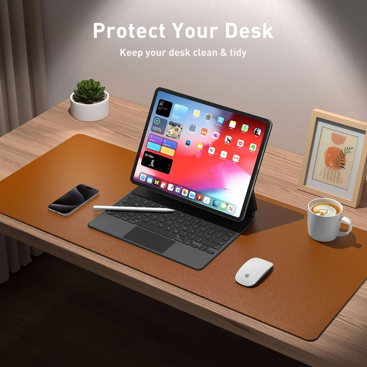 Brown desk pad on desk with laptop and mouse, smooth surface for workspace protection