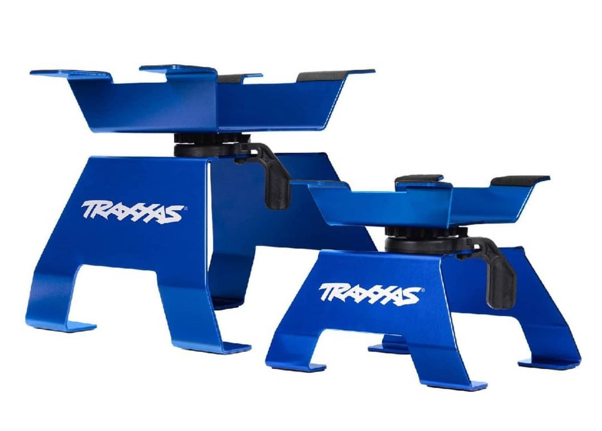 Blue aluminum TRAXXAS X-Truck stand with support legs and handle