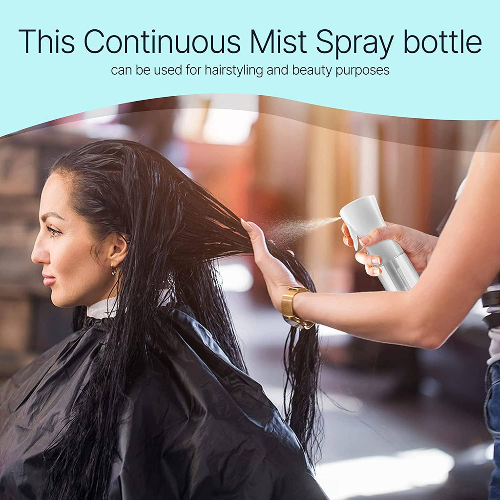 White continuous mist spray bottle dispensing fine mist onto hair