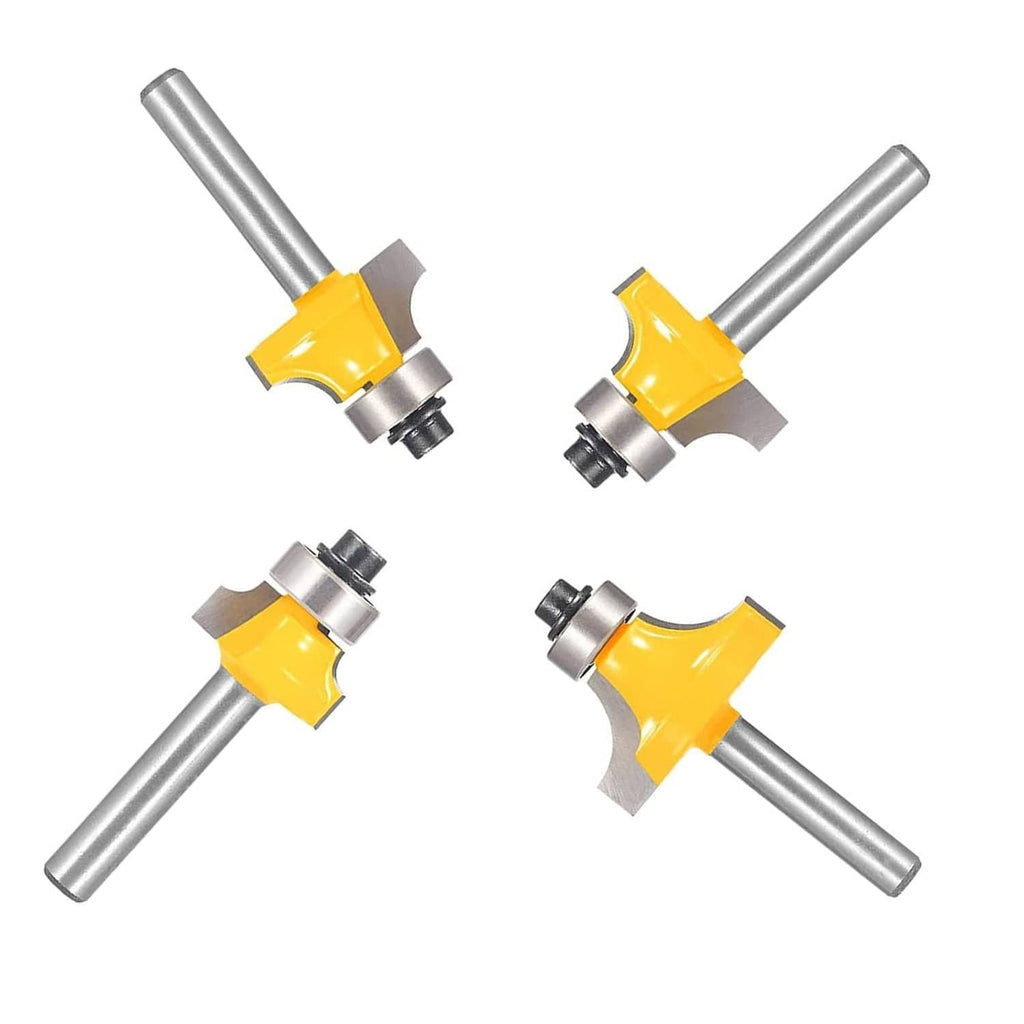 Four roundover router bits with yellow carbide cutters and metal guide bearings, cross layout