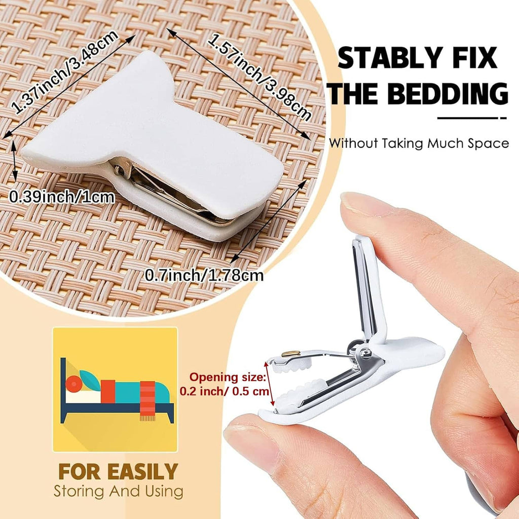 White padded comforter clip with metal spring, held by a hand