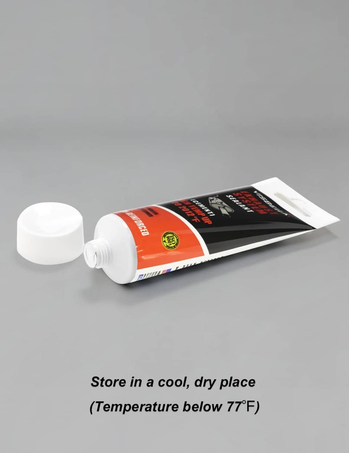 Exhaust system sealant tube, angled view with white dispensing cap and nozzle