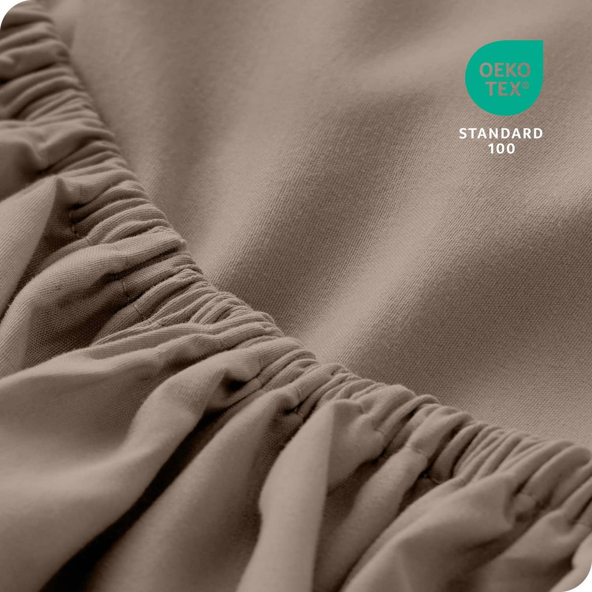 Taupe microfiber fitted sheet edge with OEK0-TEX Standard 100 certification