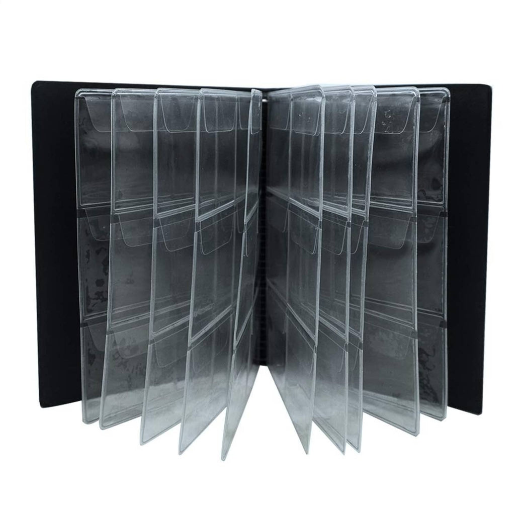 Coin collection album open to show clear plastic coin pockets inside pages