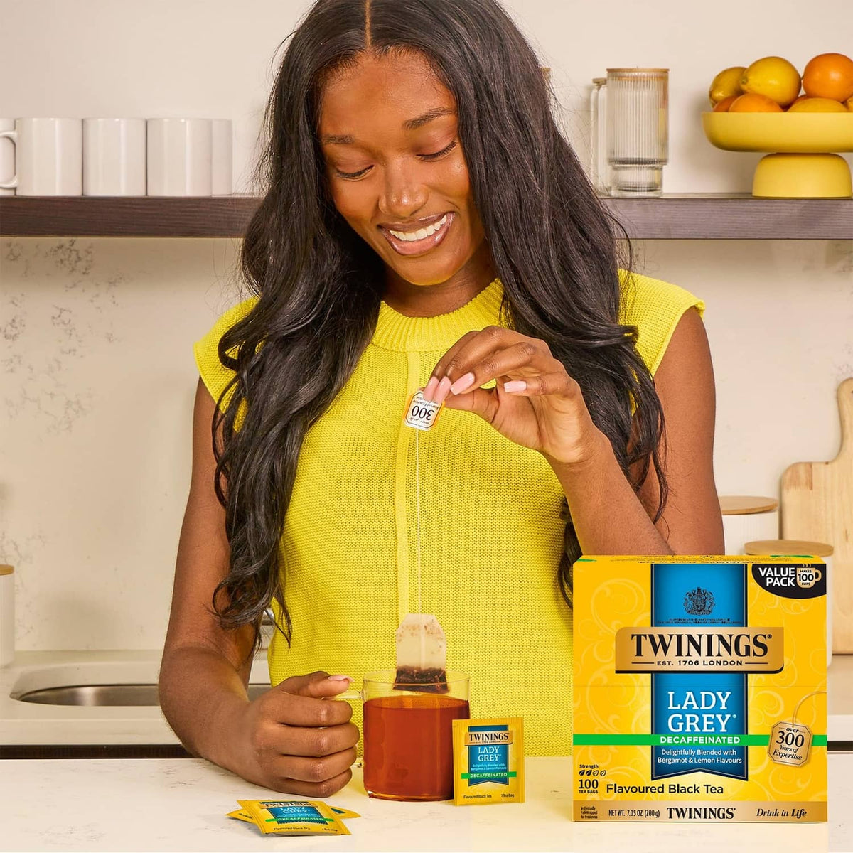 Twinings Lady Grey decaffeinated tea box with loose tea bag sachets and cup