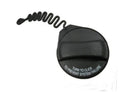 Volvo gas filler cap, round black cover with spring tether and fuel system warning text