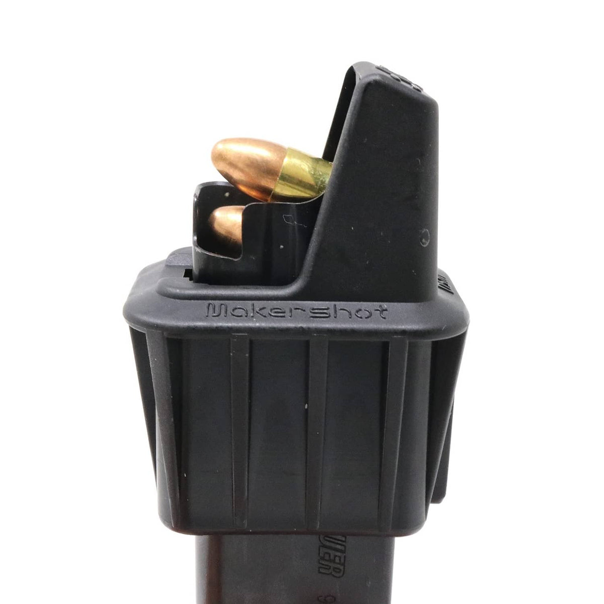 Black Makershot speed loader with brass rounds shown in angled top bay