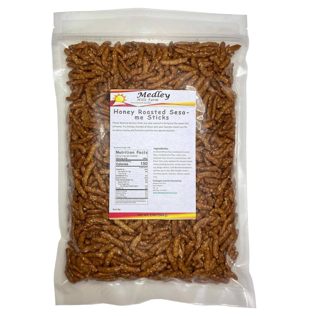 Honey roasted sesame sticks in bulk bag, sealed with label