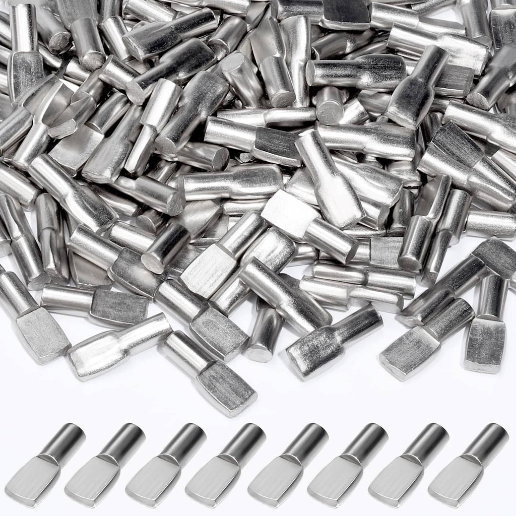 Silver metal shelf pegs with 5mm pin heads, bulk pile assortment