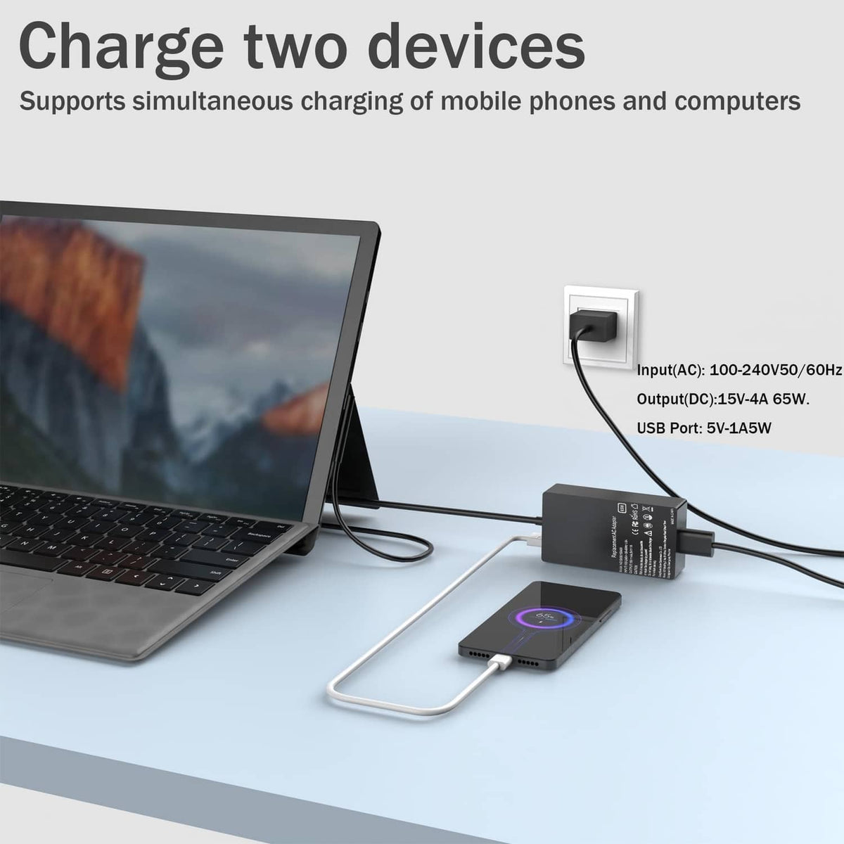 Black multi-port power adapter with USB output and DC barrel connection cable