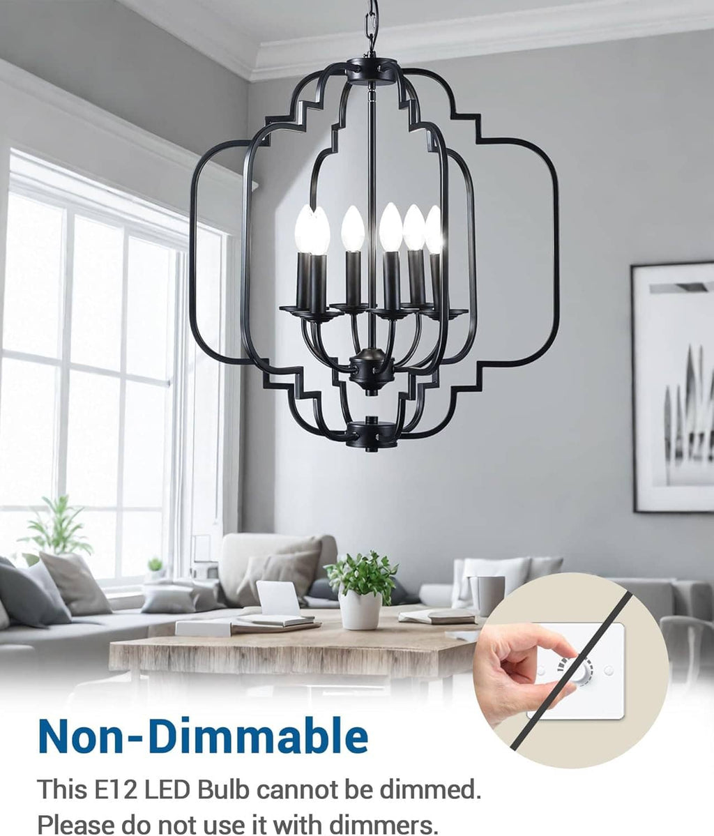 LED candelabra bulbs inside a black metal chandelier, bright white light visible.