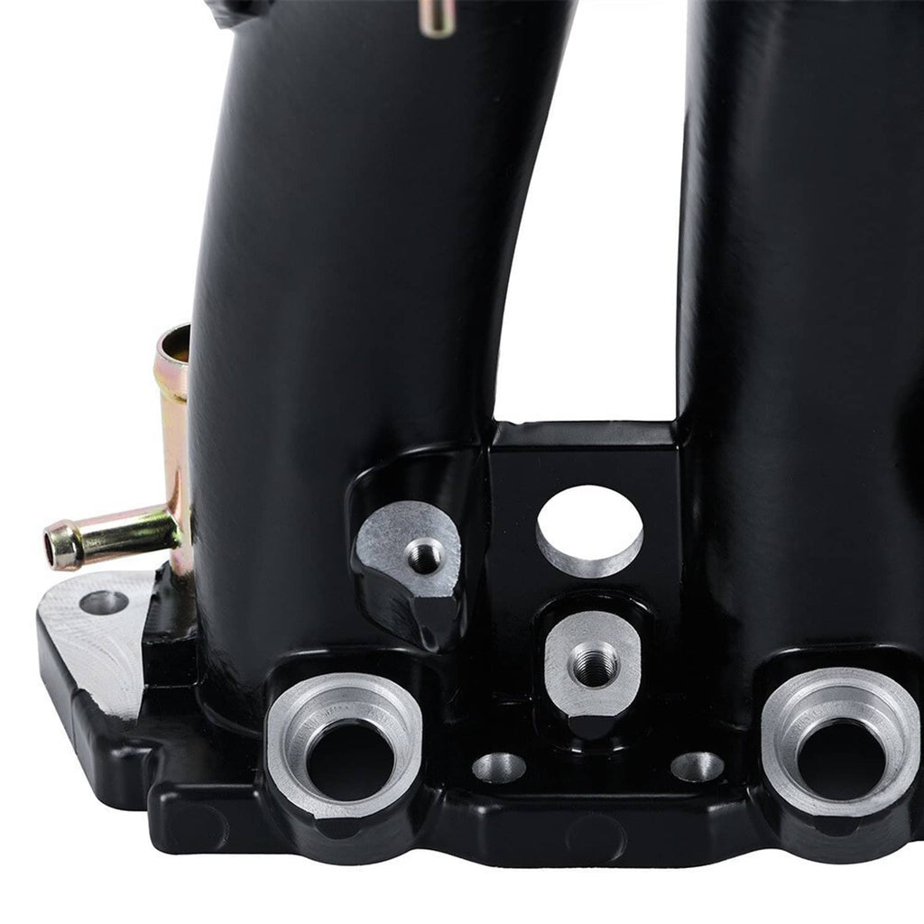Black intake manifold lower section with circular inlet ports and mounting bolts