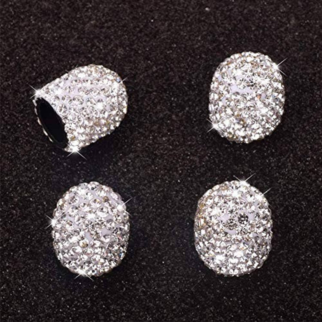 Crystal rhinestone valve stem caps, 4-pack on dark surface
