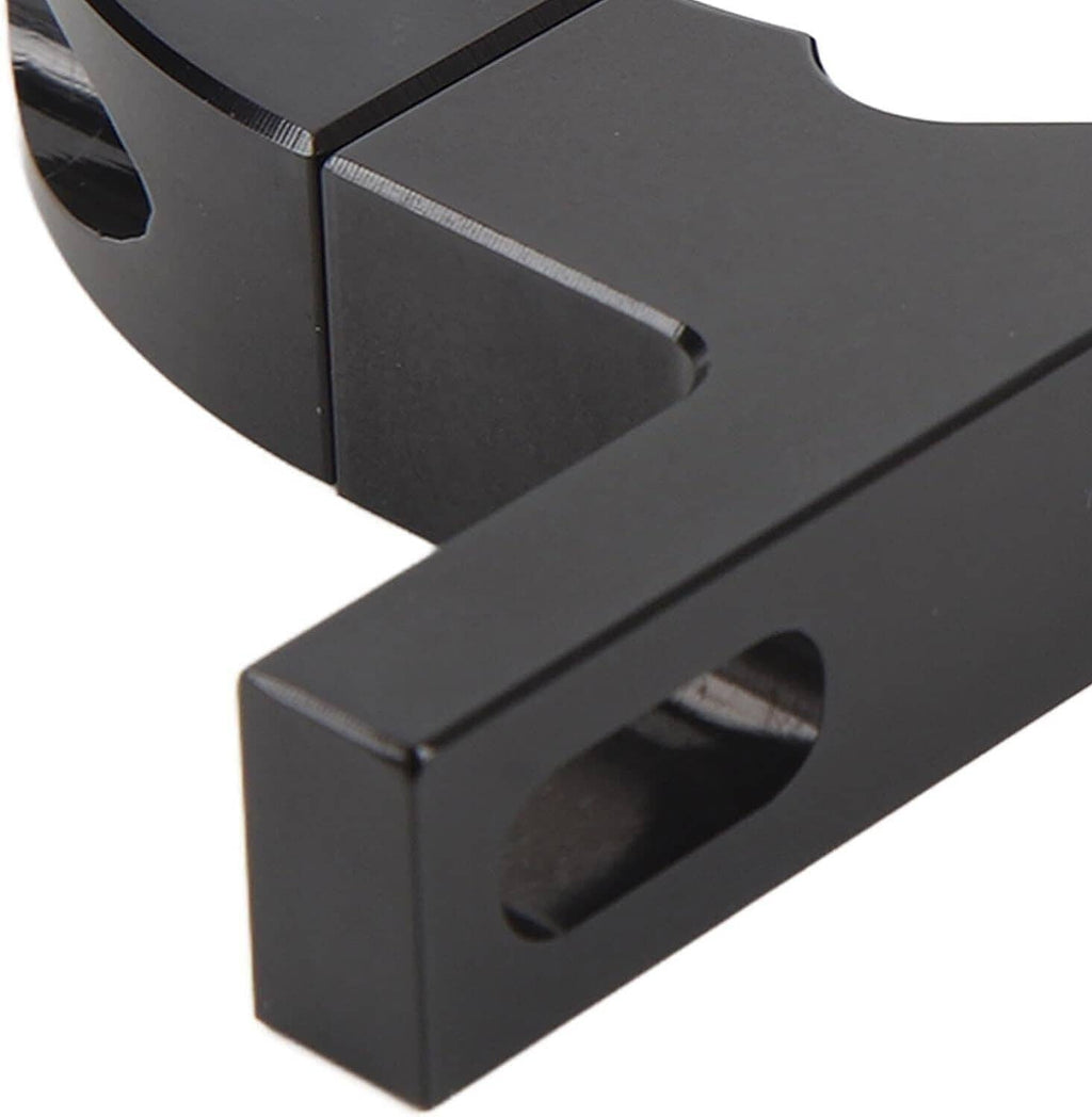 Black steering column support bracket with rectangular base and oval mounting slots.