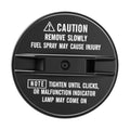 Black fuel tank cap with circular caution label and center release button