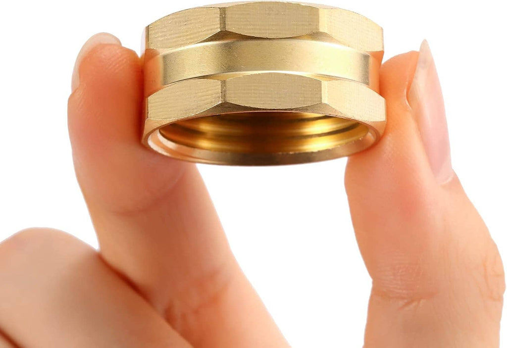 Hands installing a brass hose end cap onto a garden hose fitting