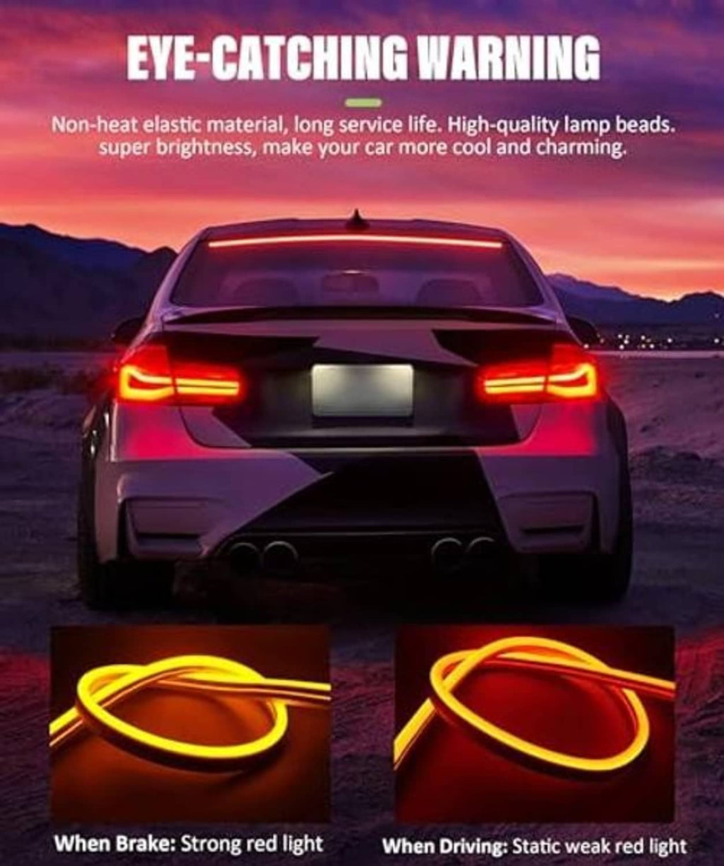 Red rear LED light strip on a car, showing bright glowing brake-style illumination