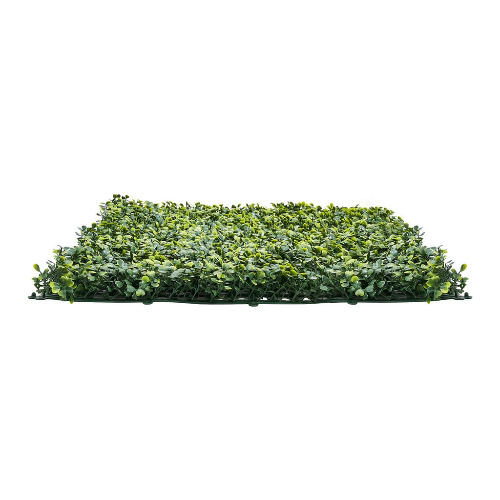 Green artificial grass mat panel with dense leaf tips and flat mesh base