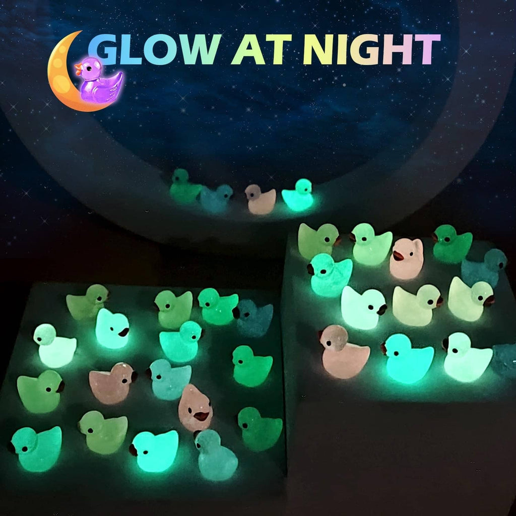 Mini resin duck figurines glowing in the dark with green light