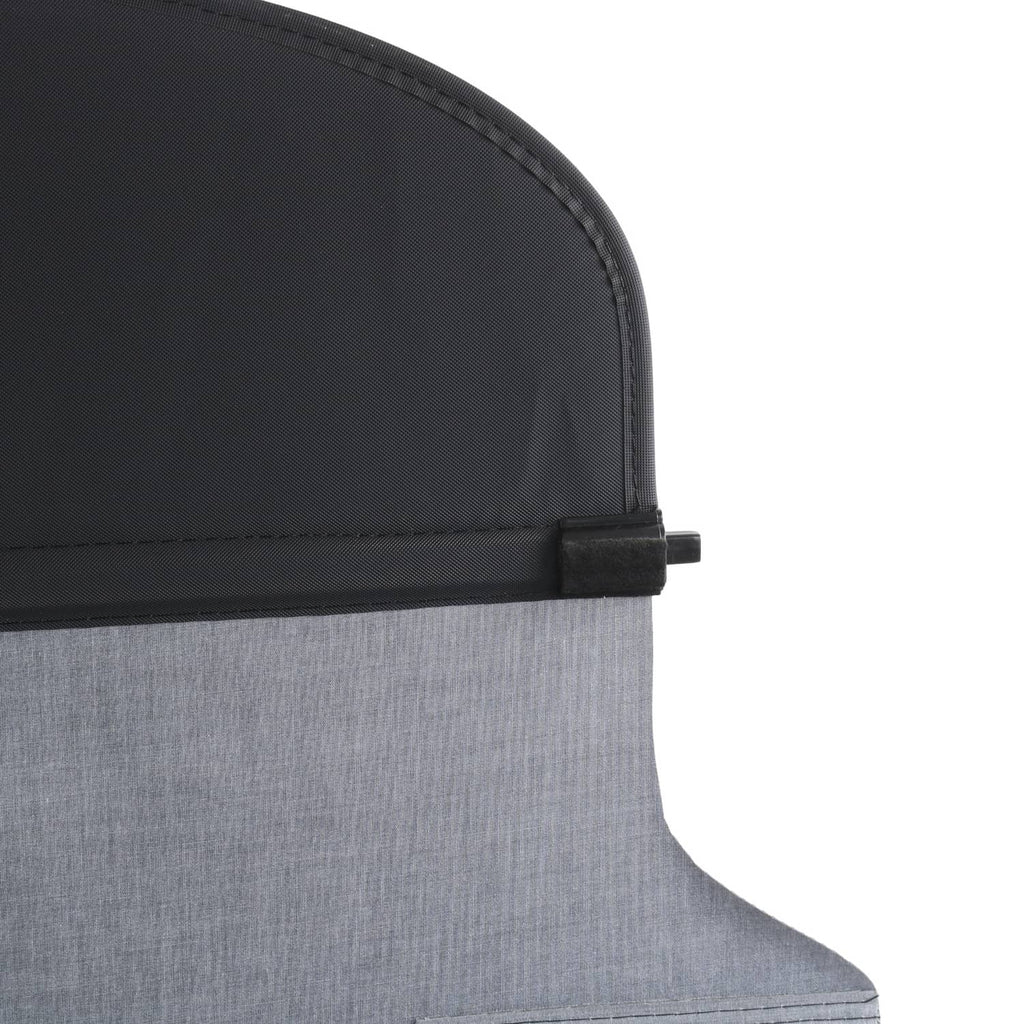 Gray cargo cover corner with curved seam and small fastening tab.