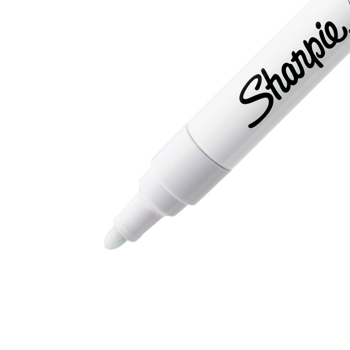 White Sharpie oil-based paint marker with medium tip, close-up